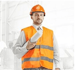 Site manager in a hard hat and hi-vis vest holding rolled blueprints